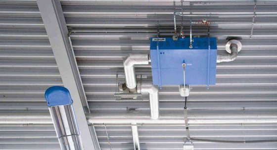 Industrial heating installed on warehouse ceiling.