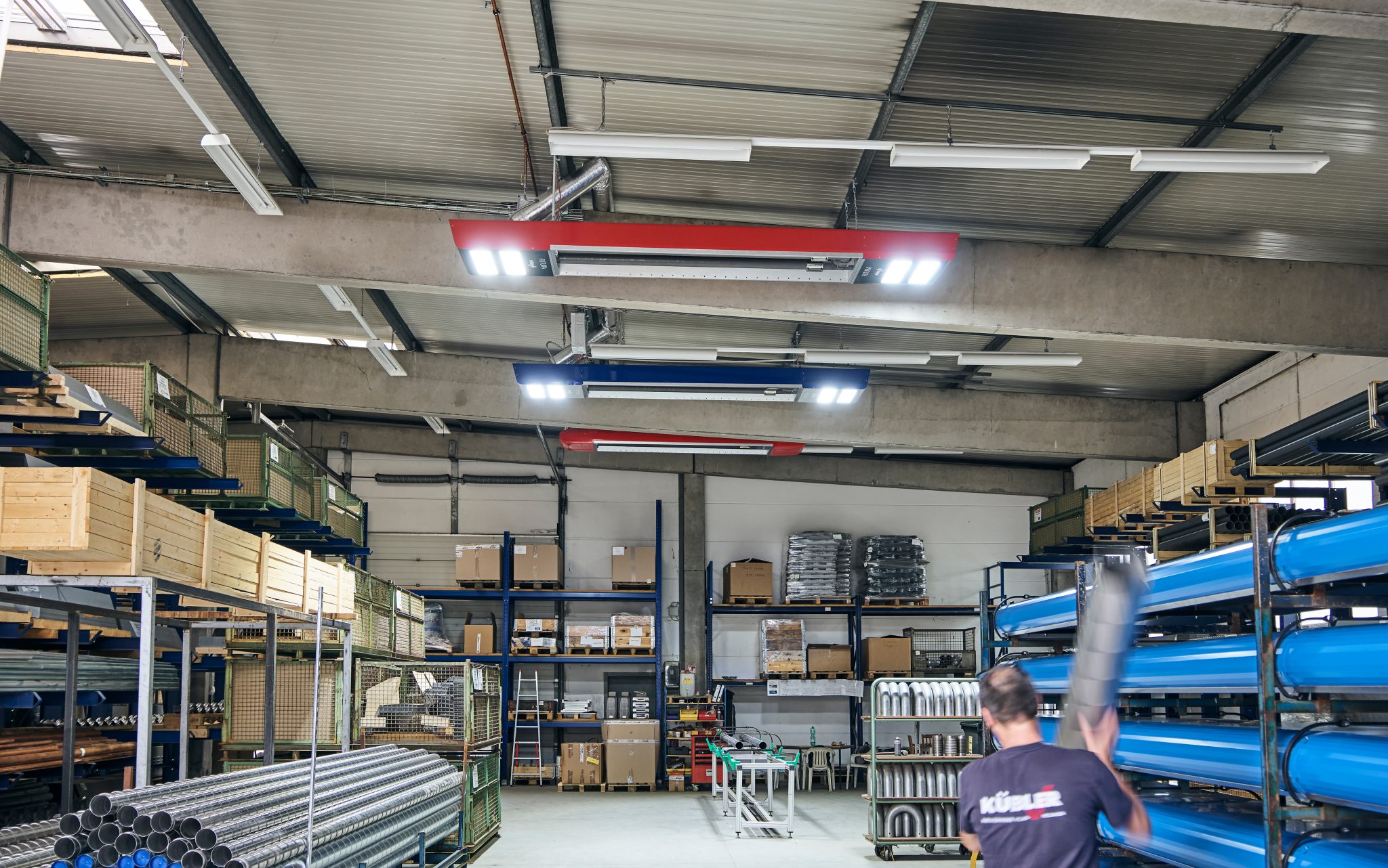 Warehouse with shelves and employee working