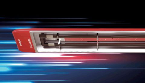 Red, modern high-speed train in motion.