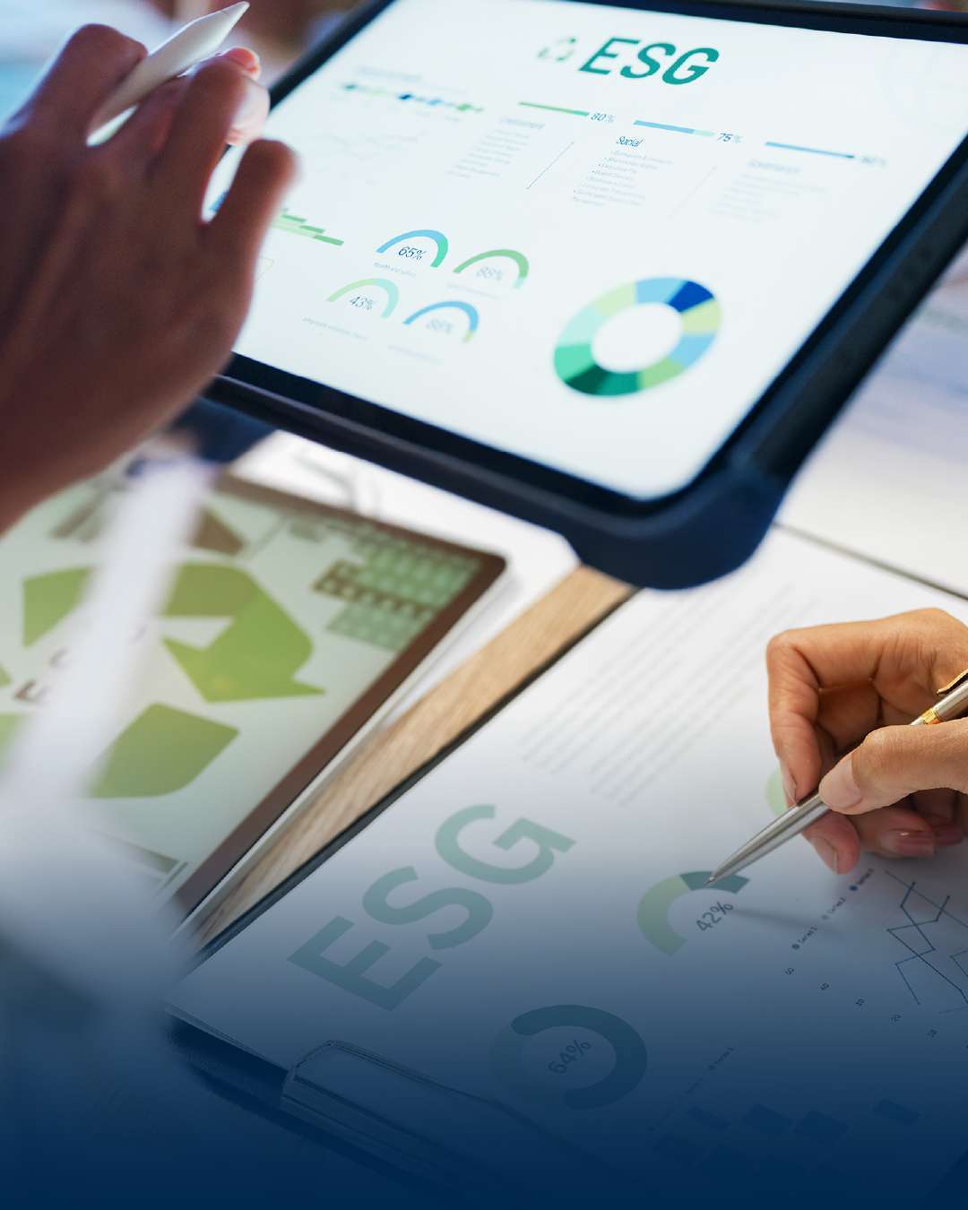 Person analyzes ESG data on tablet