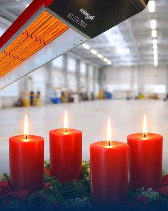 Rote Adventskerzen vor Infrarotheizung in Halle