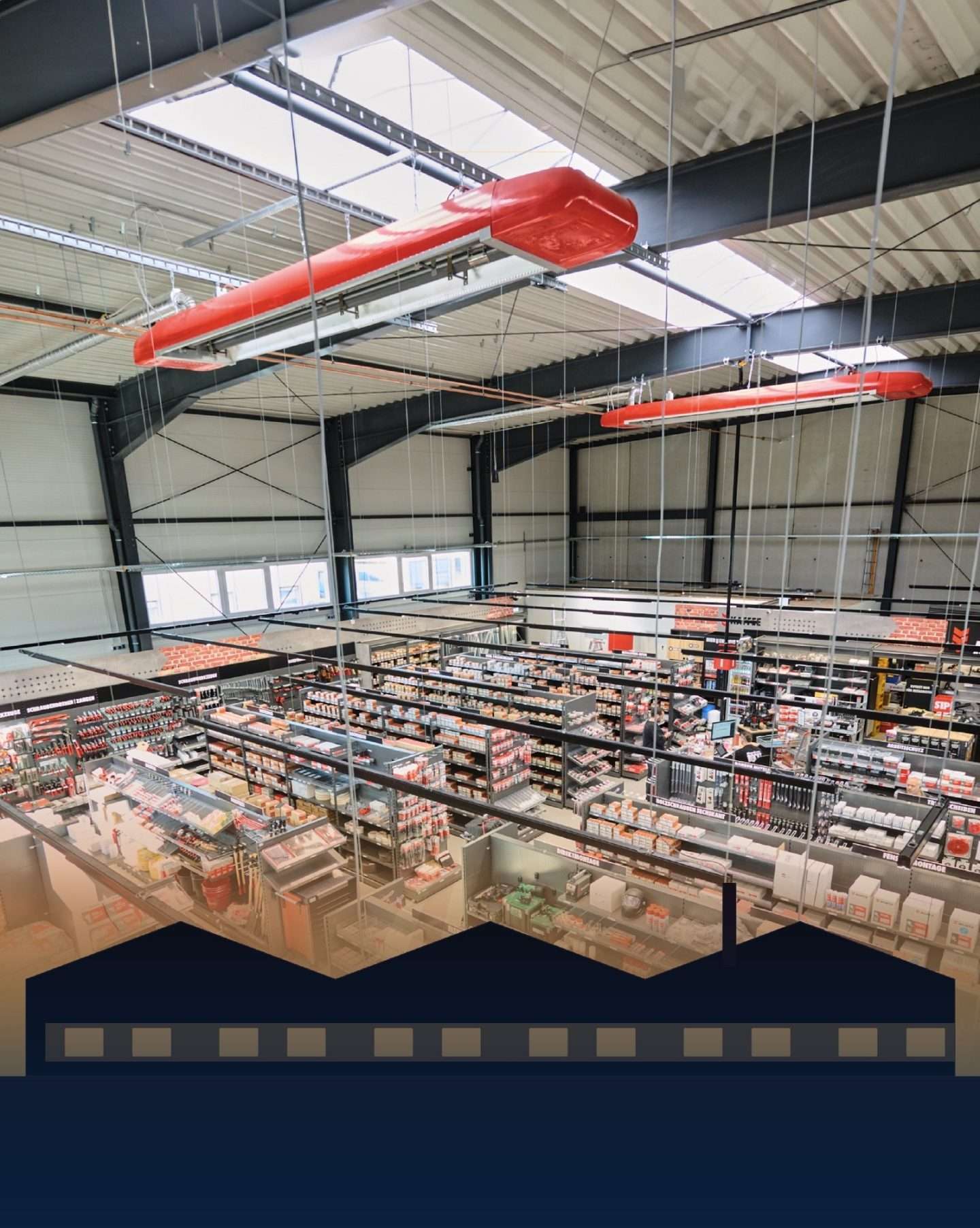 DIY store interior with red ceiling radiant heaters